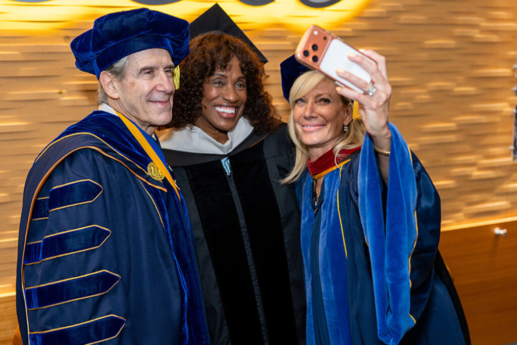 Jackie Joyner-Kersee (center) poses before her keynote commencement speech with Chancellor Julio Frenk (left) and Janet Reilly, UCLA alum and chair of the UC Board of Regents. Photo: David Esquivel/UCLA