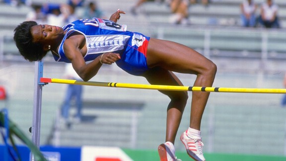 Jackie Joyner-Kersee jumping over a high jump bar