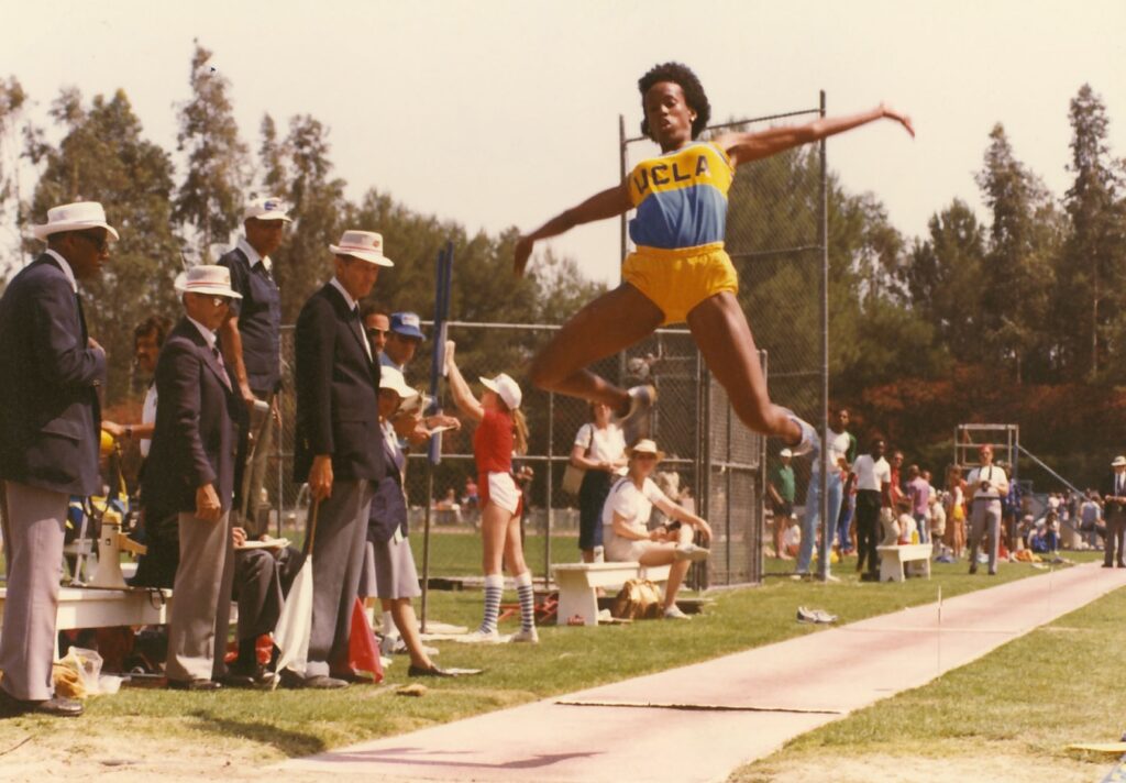 Jackie Joyner-Kersee competing in the long jump during her time at UCLA. She would go on to win a gold medal in the event at the 1988 Olympic Games in Seoul.UCLA Athletics